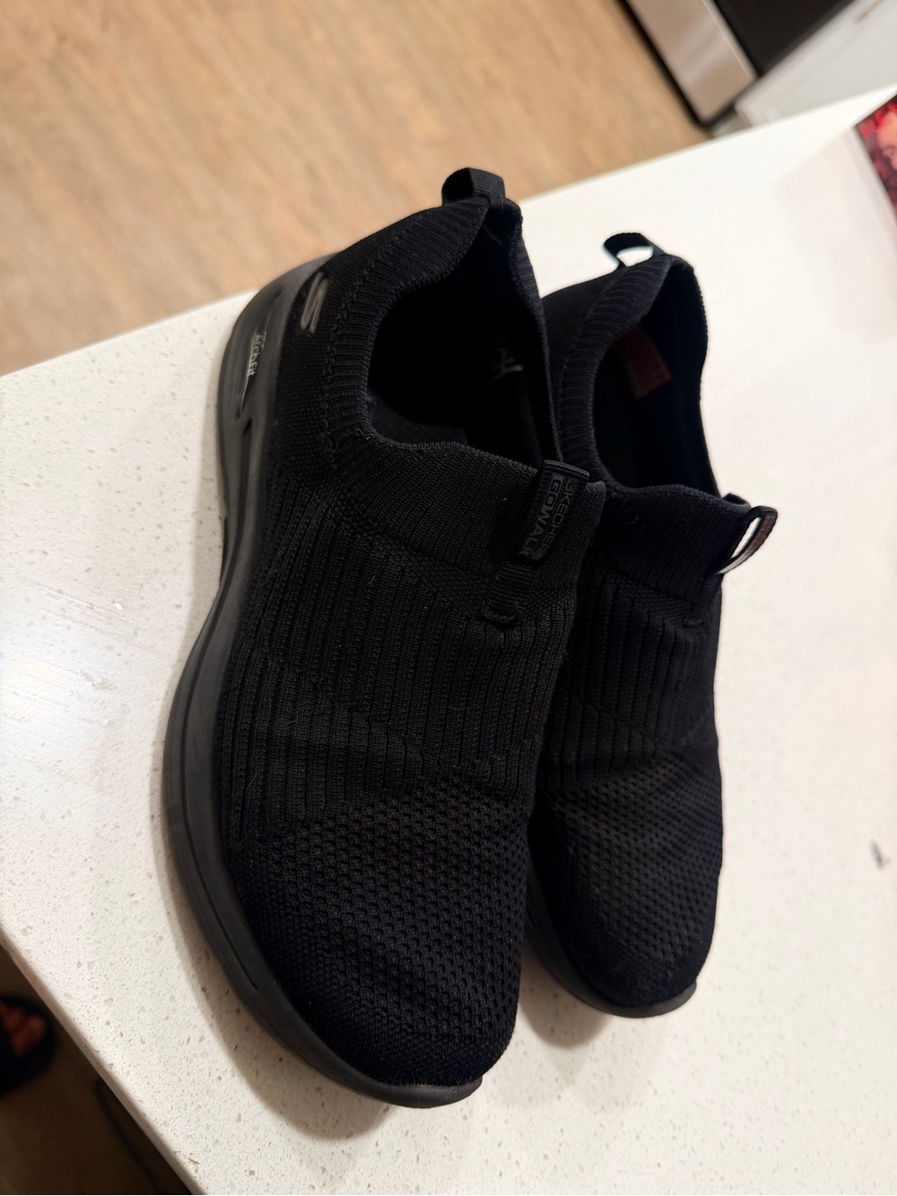 Skechers womens Black Slip-On Knit Sneakers